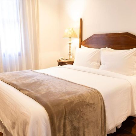 Hotel Solar Do Rosario Όρου Πρέτου Εξωτερικό φωτογραφία A bed