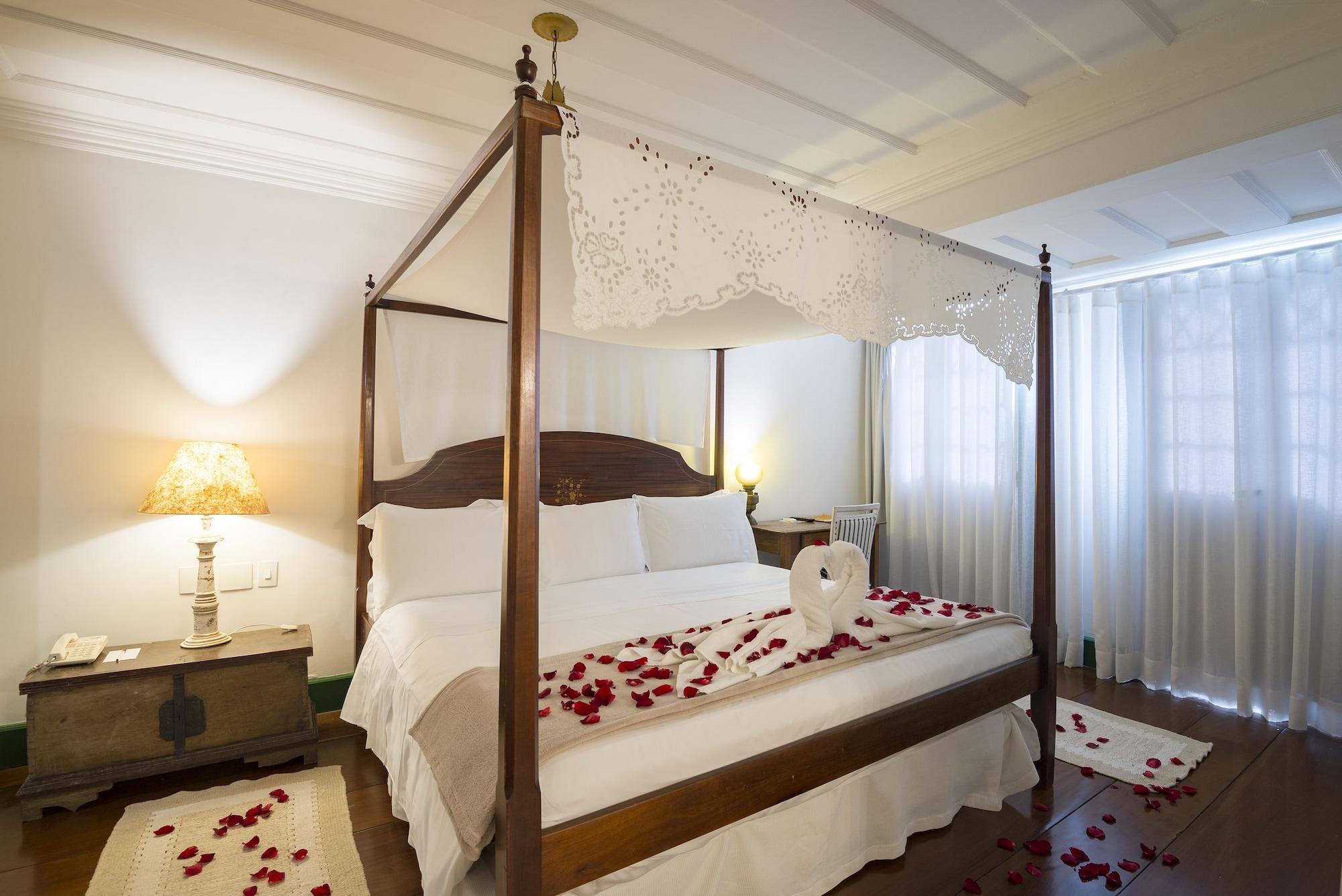 Hotel Solar Do Rosario Όρου Πρέτου Εξωτερικό φωτογραφία A four-poster bed