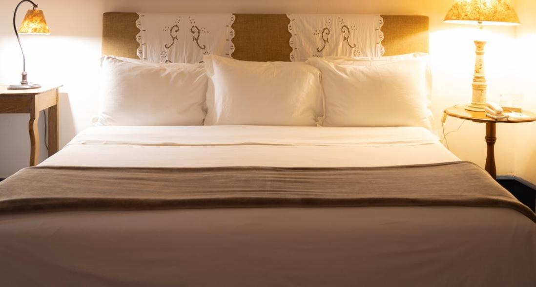 Hotel Solar Do Rosario Όρου Πρέτου Εξωτερικό φωτογραφία A bed